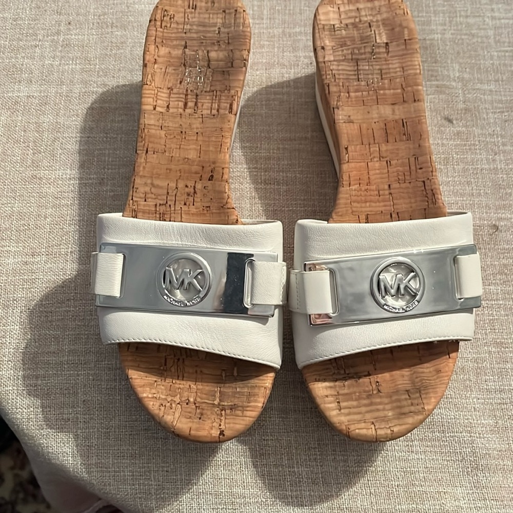 Michael Kors wedge mules. Size seven.